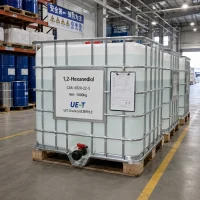1-2-hexanediol-cas-6920-22-5-1000kg-ibc-tote-bulk 1000 kg IBC totes of 1,2-Hexanediol (CAS 6920-22-5) with batch COA clipboard, ready for bulk shipment at UET Chemical warehouse