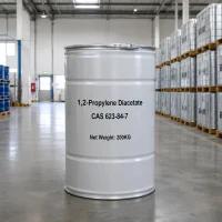 1-2-propylene-diacetate-cas-623-84-7-200kg-white-steel-drum Single 200kg white steel drum of 1,2-Propylene Diacetate CAS 623-84-7 standing on a warehouse floor, with black text showing product name, CAS number, and net weight.
