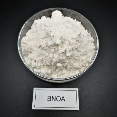 Macro close-up of pure white crystalline 2-Naphthoxyacetic Acid (BNOA) CAS 120-23-0 powder in a glass dish, highlighting its high purity physical appearance for plant growth regulator applications.