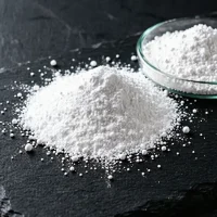 ammonium-polyphosphate-app-white-powder-granules-closeup Close-up of white Ammonium Polyphosphate (APP) powder and granules, showing its fine texture used as a high-efficiency fire retardant additive for coatings and plastics.