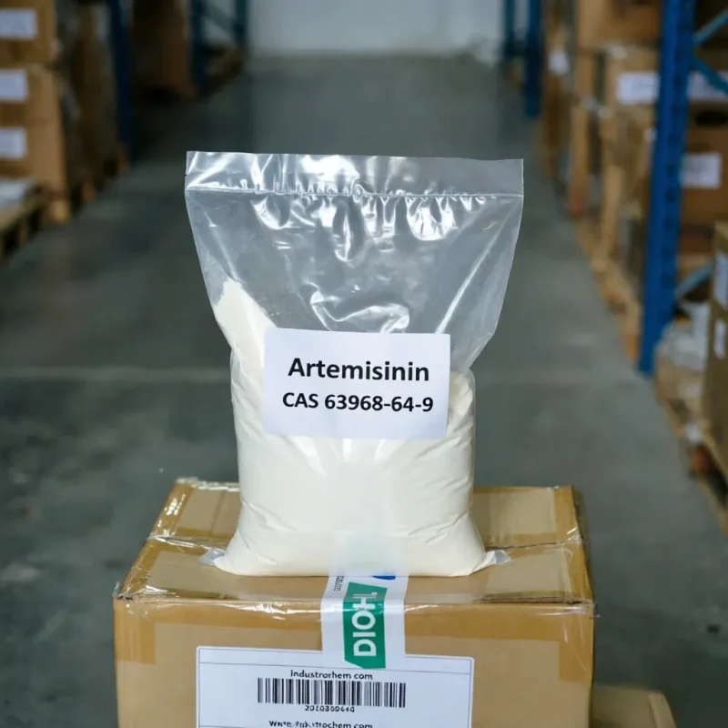 artemisinin-cas-63968-64-9-warehouse-packaging-clear-bag Clear plastic bag of bulk Artemisinin CAS 63968-64-9 powder placed on a shipping carton in a warehouse, showcasing reliable industrial supply chain and packaging for wholesale orders.