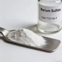 barium-sulfate-cas-7727-43-7-high-whiteness-fine-powder-sample Laboratory sample of Barium Sulfate (CAS 7727-43-7) fine white powder with a stainless steel spatula, highlighting its high whiteness, ultra-fine particle size, and excellent chemical inertness for high-quality industrial fillers.