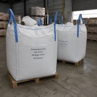 bio-based-succinic-acid-cas-110-15-6-500kg-bulk-bag-fibc Large white FIBC bulk bags containing 500kg Bio-based Succinic Acid CAS 110-15-6 on pallets, bulk packaging solution for chemical synthesis and polymer production from UET Chemical manufacturer.