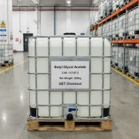 butyl-glycol-acetate-cas-112-07-2-1000l-ibc-tote-bulk-chemical-packaging-uetchemical 1000L IBC tote containing bulk supply of Butyl Glycol Acetate CAS 112-07-2 with UET Chemical branding, ready for industrial shipping.
