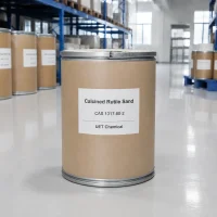 calcined-rutile-sand-cardboard-drum-packaging-warehouse Cardboard drum of Calcined Rutile Sand CAS 1317-80-2 with product label in a warehouse, surrounded by similar drums on shelves, labeled with UET Chemical branding.