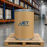 cashmeran-fiber-drum-bulk-packaging-cas-33704-61-9 Fiber drum of cashmeran fragrance chemical CAS 33704-61-9 by UET Chemical on wooden pallet in warehouse aisle