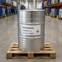 d-limonene-cas-5989-27-5-silver-metal-drum-on-pallet Silver metal drum of D-Limonene CAS 5989-27-5 on a wooden pallet in a warehouse, label showing UET Chemical branding and flammable hazard symbol.