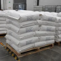 dibenzoyl-l-tartaric-acid-anhydrous-25kg-bag-stock Palletized stack of 25kg white woven bags containing Dibenzoyl-L-Tartaric Acid Anhydrous (CAS 2743-38-6), UET Chemical brand, ready for shipment in warehouse