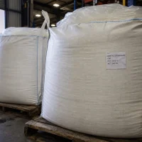 dimethyl-terephthalate-dmt-cas-120-61-6-1000kg-fibc-bags 1000kg FIBC bulk bags of Dimethyl Terephthalate DMT CAS 120-61-6 on wooden pallets at warehouse loading area