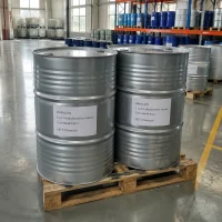 dma1270-c12-14-alkyldimethyl-amines-silver-metal-drum-warehouse Two silver metal drums (Net Weight: 200kg) of C12-14 Alkyldimethyl Amines (DMA1270, CAS 84649-84-3) on wooden pallet in warehouse aisle, labeled UET Chemical, bulk storage for chemical intermediate and fabric softener production