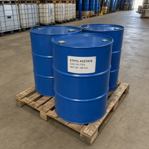 180kg blue steel drums of Ethyl Acetate CAS 141-78-6 placed on a wooden pallet in a warehouse, featuring clear product labels, indicating ready bulk stock for industrial solvent supply.