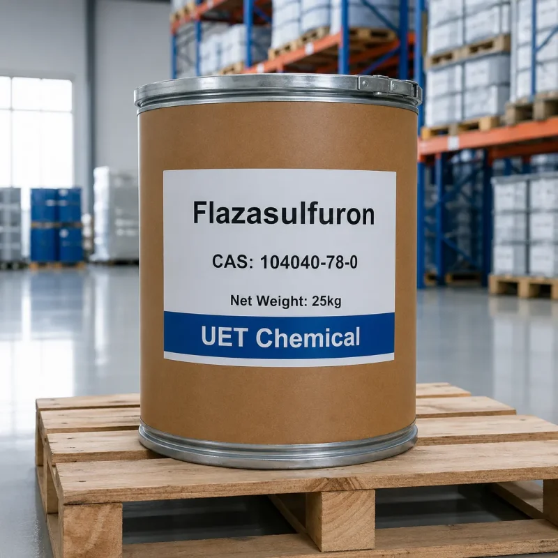 flazasulfuron-cas-104040-78-0-25kg-fiber-drum-packaging Brown fiber drum of Flazasulfuron CAS 104040-78-0 with white label showing product name, CAS number, net weight 25kg, and UET Chemical branding, placed on a wooden pallet in a warehouse.