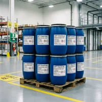 glacial-acrylic-acid-blue-plastic-drum-stack-warehouse Stacked blue plastic drums of Glacial Acrylic Acid CAS 79-10-7 on a wooden pallet in a warehouse, labeled with UET Chemical and hazard symbols, indicating safe bulk handling.