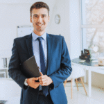 James Whitfield, Purchasing Director for North America water treatment distribution, holding a folder, symbolizing expert management in industrial chemical logistics.