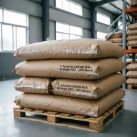 l-tyrosine-cas-60-18-4-25kg-kraft-bags 25kg kraft paper bags of L-Tyrosine CAS 60-18-4 stacked on wooden pallet in warehouse