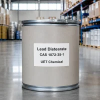 lead-distearate-industrial-drum-packaging-warehouse Industrial fiber drum packaging of Lead Distearate CAS 1072-35-1 stored in a warehouse, ready for bulk shipment by UET Chemical.
