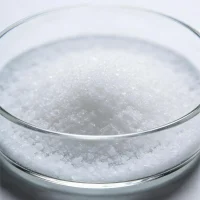 maleic-anhydride-cas-108-31-6-white-crystals-laboratory-sample Close-up laboratory sample of Maleic Anhydride (CAS 108-31-6) white crystalline powder in a glass petri dish, demonstrating the fine particle texture and strict quality control assurance.