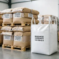 manganese-carbonate-598-62-9-bulk-bags-fibc-warehouse Stacked kraft paper bags and FIBC jumbo bag of manganese carbonate CAS 598-62-9 on pallets in warehouse