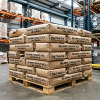A full wooden pallet loaded with 25kg bags of Melamine Cyanurate (MCA) sitting in a warehouse. The consistent labeling on the kraft paper bags confirms the material identity, ready to fulfill bulk orders for plastic additives.