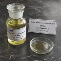 Clear glass reagent bottle filled with pale yellow liquid Methyl Tetrahydrophthalic Anhydride (MTHPA, CAS 19438-64-3) on dark stone surface with glass petri dish beside, labeled UET Chemical, sample for epoxy curing agent verification