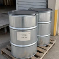 n-butyl-methacrylate-n-bma-cas-97-88-1-180kg-galvanized-steel-drums Open-head galvanized steel drums of n-butyl methacrylate (n-BMA) CAS 97-88-1, net weight 180 kg, on wooden pallet at warehouse loading area