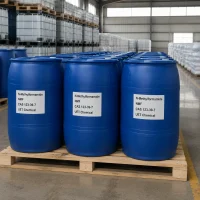 n-methylformamide-nmf-blue-drum-pallet-warehouse Multiple blue plastic drums of N-Methylformamide (NMF, CAS 123-39-7) arranged on wooden pallets in industrial warehouse, labeled UET Chemical, bulk packaging for industrial solvent applications