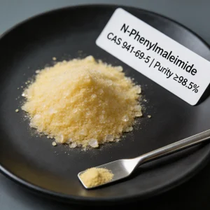 n-phenylmaleimide-cas-941-69-5-high-purity-98-percent-yellow-crystals High-purity N-Phenylmaleimide (CAS 941-69-5) yellow crystalline powder with ≥98.5% purity displayed on a dark dish with a sampling spoon, showcasing the fine texture required for polymer crosslinking and organic synthesis intermediates.