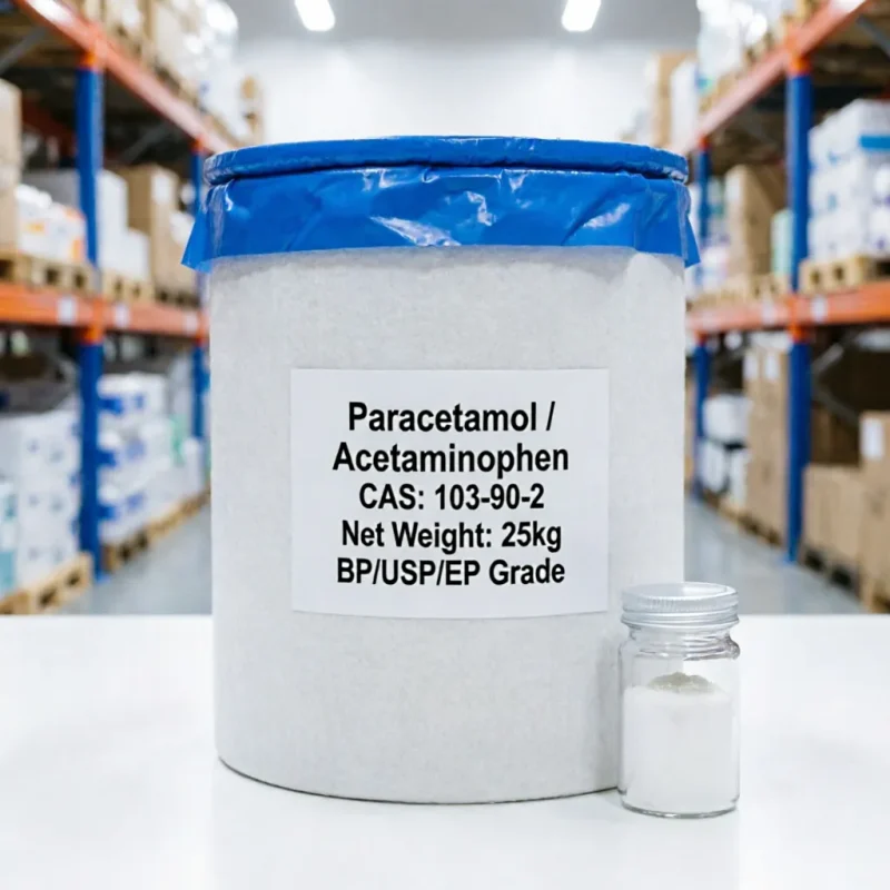 paracetamol-acetaminophen-cas-103-90-2-bpusp-ep-grade-25kg-drum Bulk 25kg fiber drum of Paracetamol/Acetaminophen CAS 103-90-2 with blue inner seal, meeting BP/USP/EP pharmaceutical grade standards, accompanied by a sample glass jar.