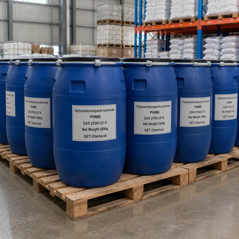 phmb-cas-27083-27-8-blue-plastic-drum-bulk-packaging Row of blue plastic drums (Net Weight: 200kg each) containing Poly(hexamethylenebiguanide) hydrochloride (PHMB, CAS 27083-27-8) stacked on wooden pallets in warehouse, labeled UET Chemical, industrial bulk packaging for water treatment and textile industry use