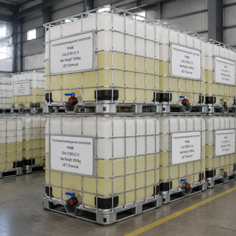 phmb-cas-27083-27-8-ibc-ton-container-bulk-storage Stacked white IBC ton containers (Net Weight: 1000kg each) of Poly(hexamethylenebiguanide) hydrochloride (PHMB, CAS 27083-27-8) in warehouse, labeled UET Chemical, large-scale industrial storage for export and bulk chemical supply