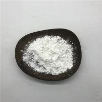 taurine-cas-107-35-7-white-crystalline-powder-closeup Macro close-up of pure white crystalline Taurine CAS 107-35-7 powder on a dark ceramic plate, showcasing its fine crystalline texture and high purity as a food and feed additive.