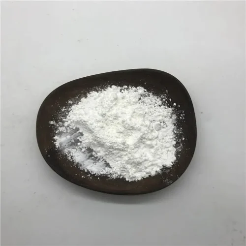 taurine-cas-107-35-7-white-crystalline-powder-closeup Macro close-up of pure white crystalline Taurine CAS 107-35-7 powder on a dark ceramic plate, showcasing its fine crystalline texture and high purity as a food and feed additive.