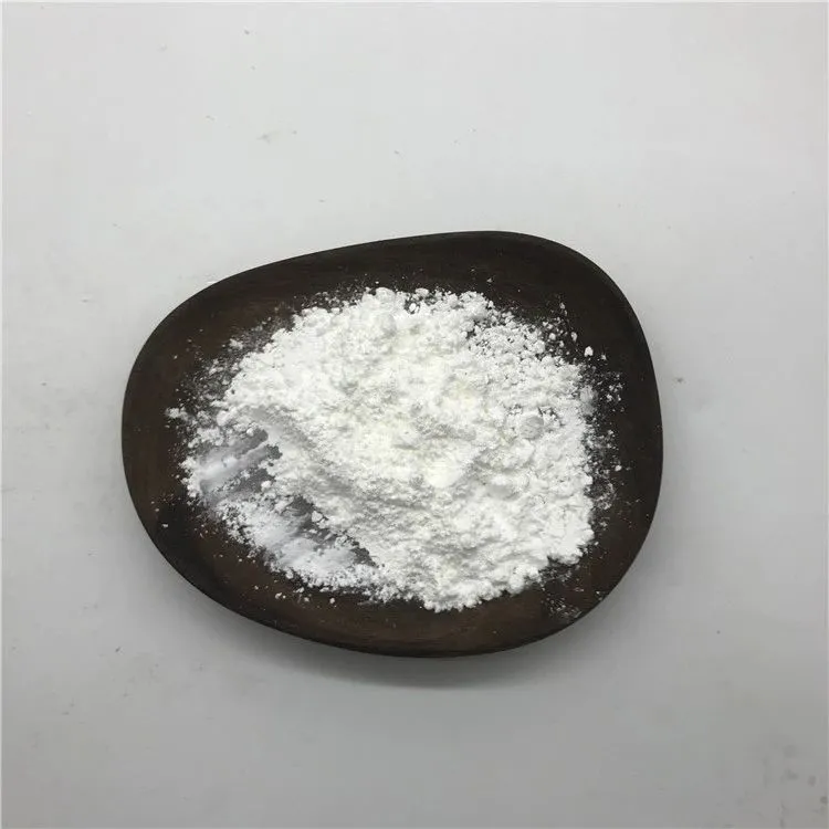 taurine-cas-107-35-7-white-crystalline-powder-closeup Macro close-up of pure white crystalline Taurine CAS 107-35-7 powder on a dark ceramic plate, showcasing its fine crystalline texture and high purity as a food and feed additive.