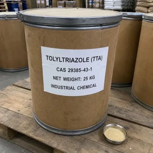 tolyltriazole-tta-cas-29385-43-1-25kg-fiber-drum-sample A 25kg brown fiber drum of Tolyltriazole (TTA) CAS 29385-43-1 with sample bowl of pale yellow granules beside it, labeled industrial chemical, on wooden pallet in warehouse.