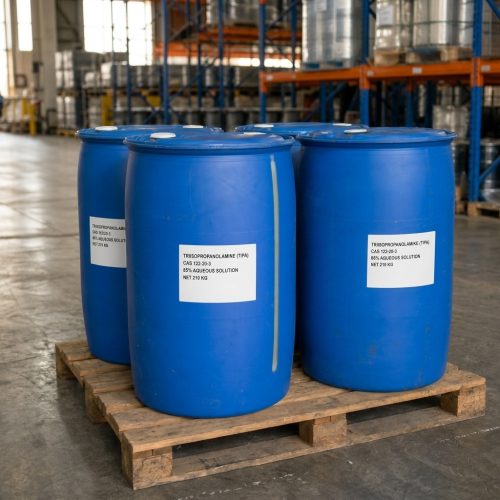 Three blue plastic drums of Triisopropanolamine (TIPA) CAS 122-20-3, each labeled as 85% aqueous solution with net weight 210kg, stacked on a wooden pallet in a warehouse with shelving in the background.