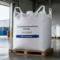 trimethylstearylammonium-chloride-cas-112-03-8-white-ton-bag-in-warehouse Large white ton bag of Trimethylstearylammonium Chloride CAS 112-03-8 on a wooden pallet inside a warehouse, labeled with UET Chemical branding.