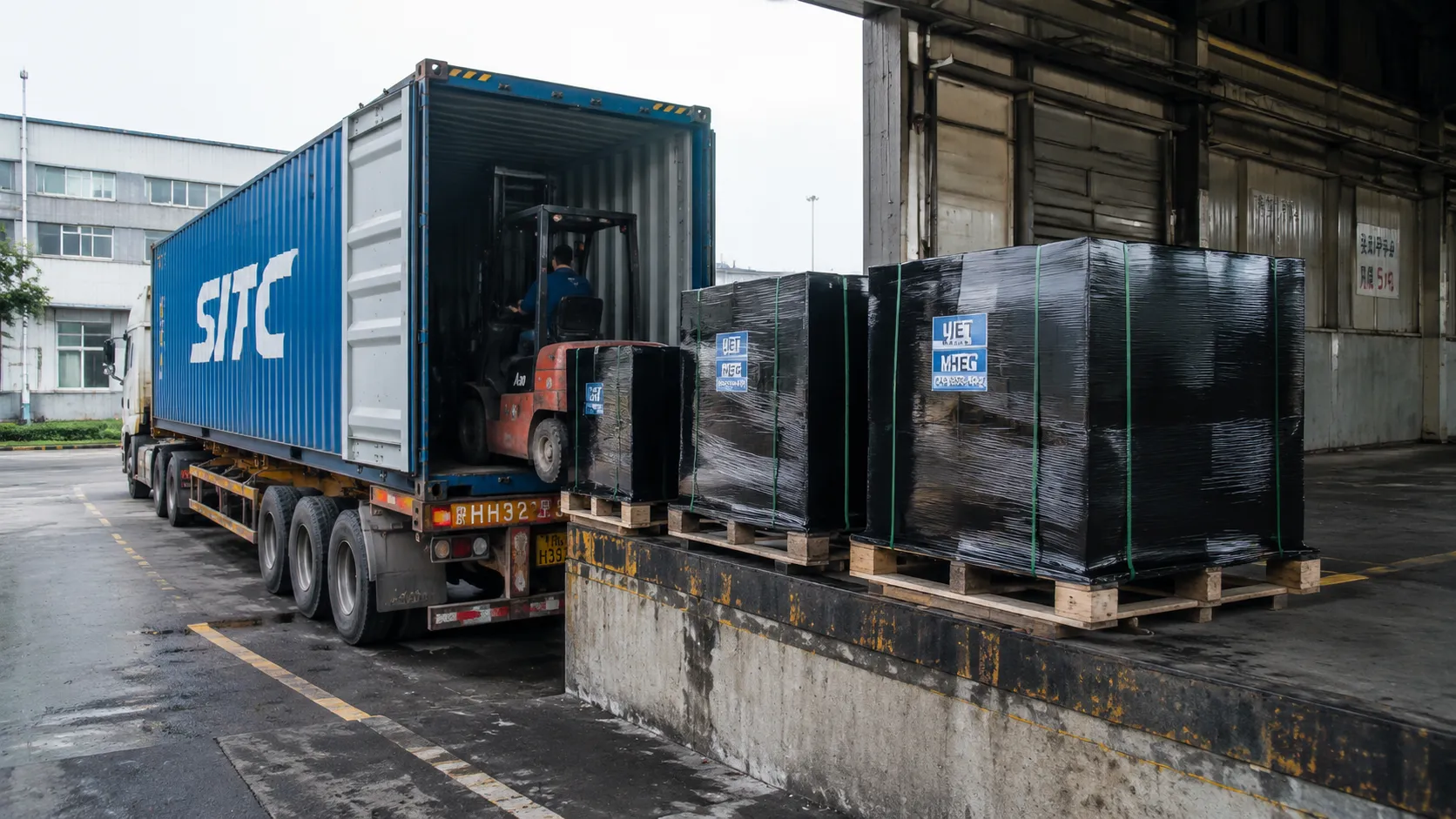 Export logistics loading dock at UETChem facility with shipping containers and palletized chemical products ready for multimodal global delivery.