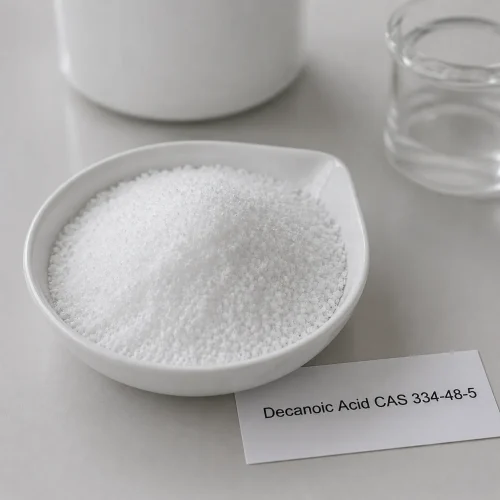 white-crystalline-decanoic-acid-capric-acid-powder-cas-334-48-5 White crystalline decanoic acid capric acid powder CAS 334-48-5 in white ceramic dish with product label card