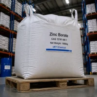 zinc-borate-cas-12767-90-7-1000kg-white-fibc-bulk-bag A 1000kg white FIBC bulk bag of Zinc Borate CAS 12767-90-7 on a wooden pallet, labeled with UET Chemical branding, suitable for industrial bulk procurement.